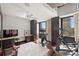 Well-equipped home gym with a stationary bike and treadmill at 139 S Tryon St # 6, Charlotte, NC 28202