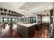 Gourmet kitchen boasts expansive island, stainless steel appliances, and ample counter space at 139 S Tryon St # 6, Charlotte, NC 28202