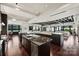 Modern kitchen with large island and hardwood floors at 139 S Tryon St # 6, Charlotte, NC 28202