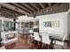 Modern dining area with hardwood floors and kitchen access at 139 S Tryon St # 6, Charlotte, NC 28202