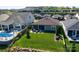 Aerial view of home with pool and landscaped backyard in a neighborhood setting at 4830 Looking Glass Trl, Denver, NC 28037