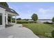 Spacious patio with lake view, offering serene outdoor living at 18612 Balmore Pines Ln, Cornelius, NC 28031