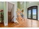 Elegant entryway with a grand staircase and double doors at 590-0 Tuckertown Rd, New London, NC 28127