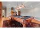Game room with pool table and a richly patterned area rug at 590-0 Tuckertown Rd, New London, NC 28127