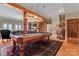 Game room with pool table, fireplace, and access to living area at 590-0 Tuckertown Rd, New London, NC 28127