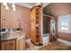 Bathroom with a shower/tub combo and built-in shelving at 590-0 Tuckertown Rd, New London, NC 28127