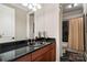 Bathroom with granite countertop, modern sink, and shower/tub combo at 590-0 Tuckertown Rd, New London, NC 28127