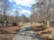 Gated entrance to the property with stonework at 590-0 Tuckertown Rd, New London, NC 28127