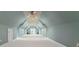 Spacious bonus room with high ceilings and two ceiling fans at 590-0 Tuckertown Rd, New London, NC 28127