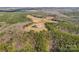 Aerial view of property with home and extensive acreage at 590-0 Tuckertown Rd, New London, NC 28127