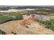 Aerial view of property showcasing house and waterfront at 590-0 Tuckertown Rd, New London, NC 28127