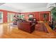 Spacious living room with hardwood floors, fireplace, and comfortable furniture at 4809 Us 74 Hwy, Wingate, NC 28174
