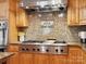 Well-equipped kitchen featuring gas cooktop and granite countertops at 4809 Us 74 Hwy, Wingate, NC 28174