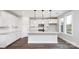 Modern kitchen with white cabinets and island at 5192 Valita Rd, York, SC 29745