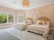 Charming bedroom with twin beds and a whimsical rainbow wall at 9044 Island Point Rd, Charlotte, NC 28278