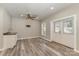 Spacious bonus room with vinyl flooring, French doors, and wet bar at 159 Badin Lake Cir, New London, NC 28127