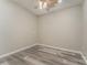 Spacious bedroom with vinyl flooring and a ceiling fan at 159 Badin Lake Cir, New London, NC 28127