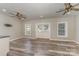 Bright bonus room featuring vinyl flooring and French doors at 159 Badin Lake Cir, New London, NC 28127