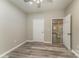 Finished basement bedroom with vinyl flooring and access to other rooms at 159 Badin Lake Cir, New London, NC 28127