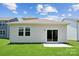 Rear view of house with sliding glass doors and patio at 609 Cashion Rd, York, SC 29745