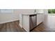Kitchen island with granite countertop and stainless steel dishwasher at 609 Cashion Rd, York, SC 29745