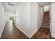 Bright entryway with hardwood floors and view of kitchen and staircase at 609 Cashion Rd, York, SC 29745