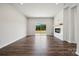 Living room with fireplace, hardwood floors, and sliding glass doors at 609 Cashion Rd, York, SC 29745