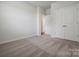 Carpeted bedroom with double doors and hallway view at 609 Cashion Rd, York, SC 29745