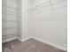 Walk-in closet with wire shelving and carpeting at 609 Cashion Rd, York, SC 29745