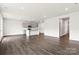 Bright and airy living room with hardwood floors and recessed lighting at 634 Cashion Rd, York, SC 29745