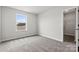Well-lit bedroom with carpet and a walk-in closet at 634 Cashion Rd, York, SC 29745