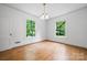 Bright living room with hardwood floors and large windows at 101 2Nd Se St, Catawba, NC 28609