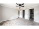 Bright bedroom with wood-look flooring and ceiling fan at 122 River Ridge Ln, Hickory, NC 28601