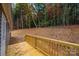 Wooden deck with railing offering a view of the woods at 122 River Ridge Ln, Hickory, NC 28601