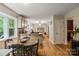 Kitchen dining area with wood table and access to kitchen at 15016 Rocky River Rd, Davidson, NC 28036