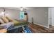 Bedroom with hardwood floors, bed, and pet ramp at 15016 Rocky River Rd, Davidson, NC 28036