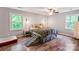 Bright bedroom with hardwood floors, a bed and pet ramp at 15016 Rocky River Rd, Davidson, NC 28036