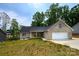 Brick ranch home with attached garage and landscaping at 539 N C Ave, Maiden, NC 28650