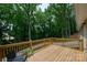 Wooden deck overlooking a wooded area, perfect for relaxing at 539 N C Ave, Maiden, NC 28650