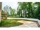 Brick house with a deck, fenced yard, and concrete pad at 539 N C Ave, Maiden, NC 28650