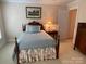 Charming bedroom with antique wooden bed and tranquil decor at 500 Muirfield Dr, Albemarle, NC 28001