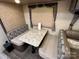 Dinette with seating for four in the main living space at 150 Marina Dr, New London, NC 28127