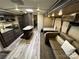 Open concept living area with kitchen, dinette, and sofa at 150 Marina Dr, New London, NC 28127