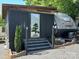 Cozy cabin with screened porch and bonsai tree at 150 Marina Dr, New London, NC 28127