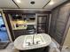 Galley kitchen with double sink and stainless steel appliances at 150 Marina Dr, New London, NC 28127