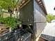 Side view of a screened porch with black accents at 150 Marina Dr, New London, NC 28127