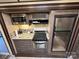 Well-equipped kitchen with microwave and full-size refrigerator at 150 Marina Dr, New London, NC 28127