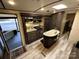 Modern kitchen with island and exterior access at 150 Marina Dr, New London, NC 28127