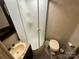 Clean bathroom with a shower and toilet at 150 Marina Dr, New London, NC 28127