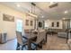 Open dining area with a large table and access to the kitchen at 424 Wharton St, Monroe, NC 28110